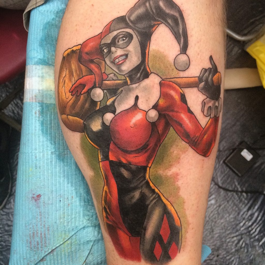 Full-colour Harley Quinn tattoo on a forearm