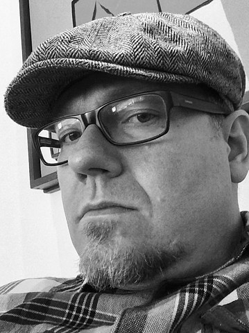 Brett Schwindt, tattoo artist at Strange World