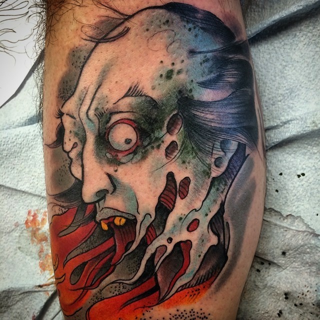 Full-colour Japanese folk horror ghoul tattooed on a leg by Brett Schwindt